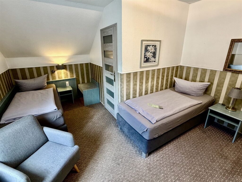 Zimmer 9 · Zwei getrennte Betten